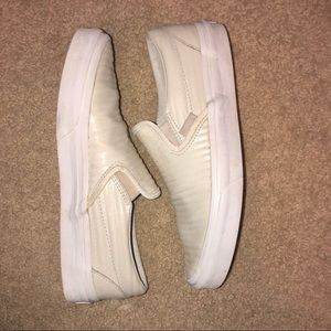 White leather slip on vans